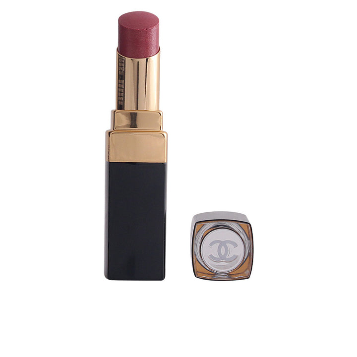 Sheer, luminous brown lipstick in compact tube, creamy finish