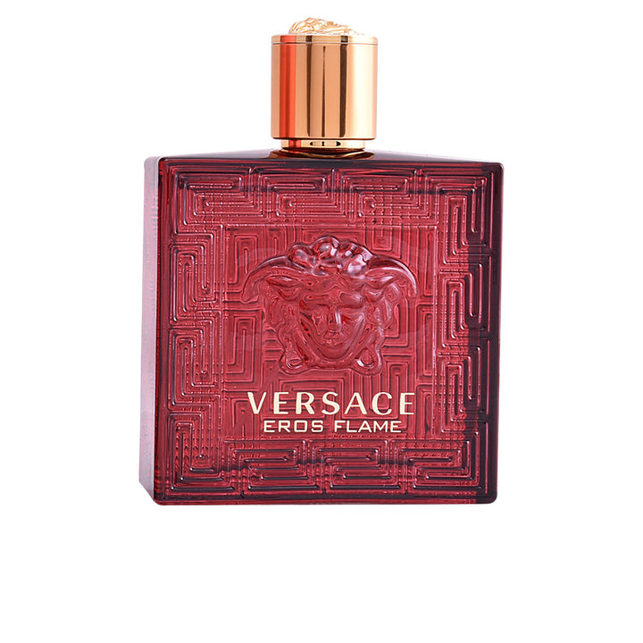 Red glass 100 ml fragrance bottle with gold lettering and bold stopper