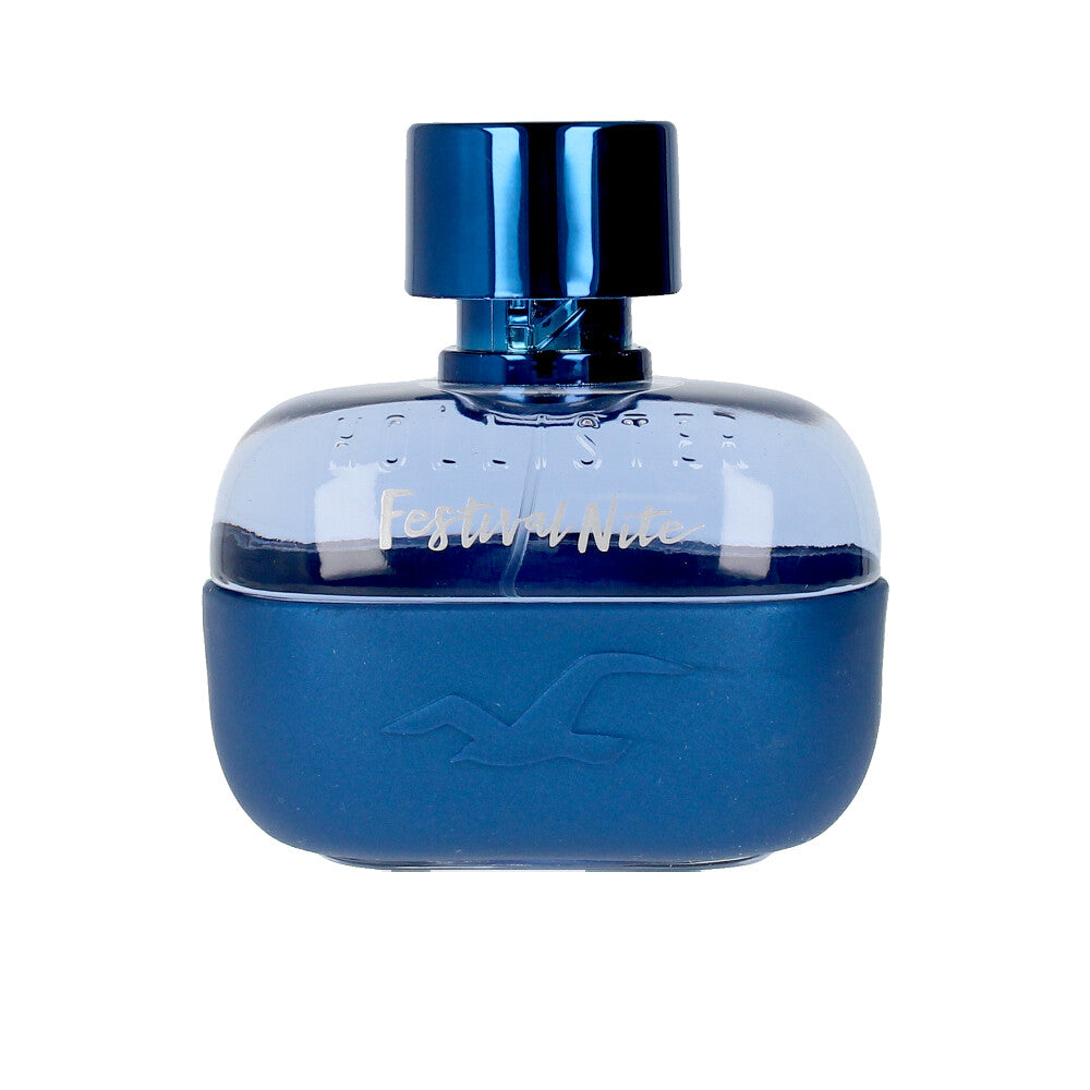 Clear glass 100 ml perfume bottle with light amber liquid, spiced citrus fragrance