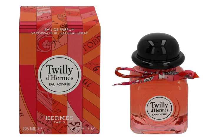 Square coral-tinted perfume bottle with hand-tied silk ribbon, 85 ml