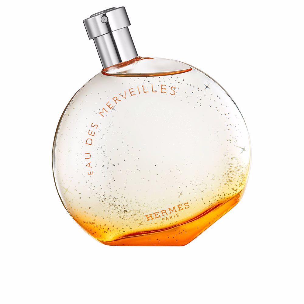 Rounded glass bottle of amber-hued eau de parfum, 50 ml, woody amber notes