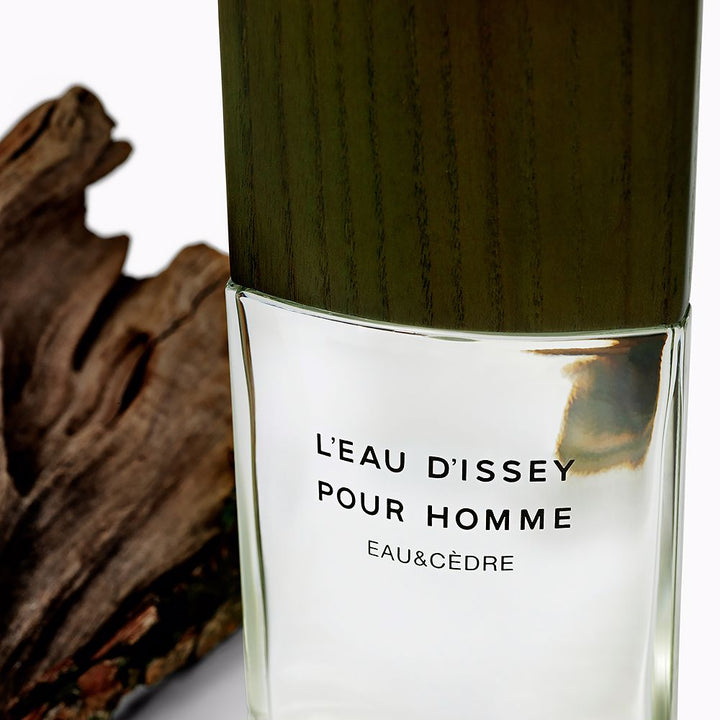 Minimal khaki 50 ml eau de toilette bottle with ash-wood cap, cedar-inspired scent