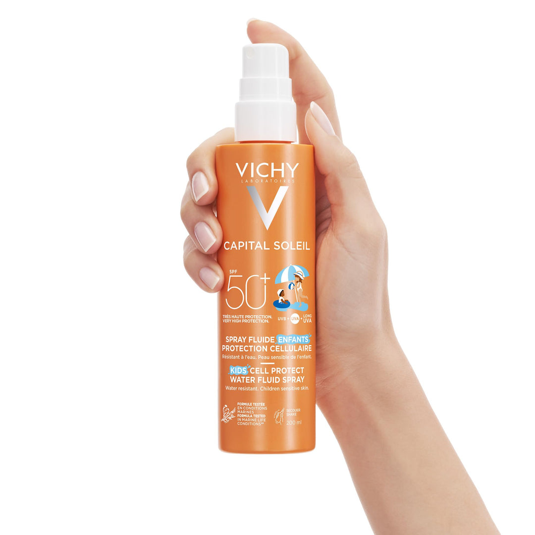 Vichy white and orange SPF50+ spray bottle for children&
