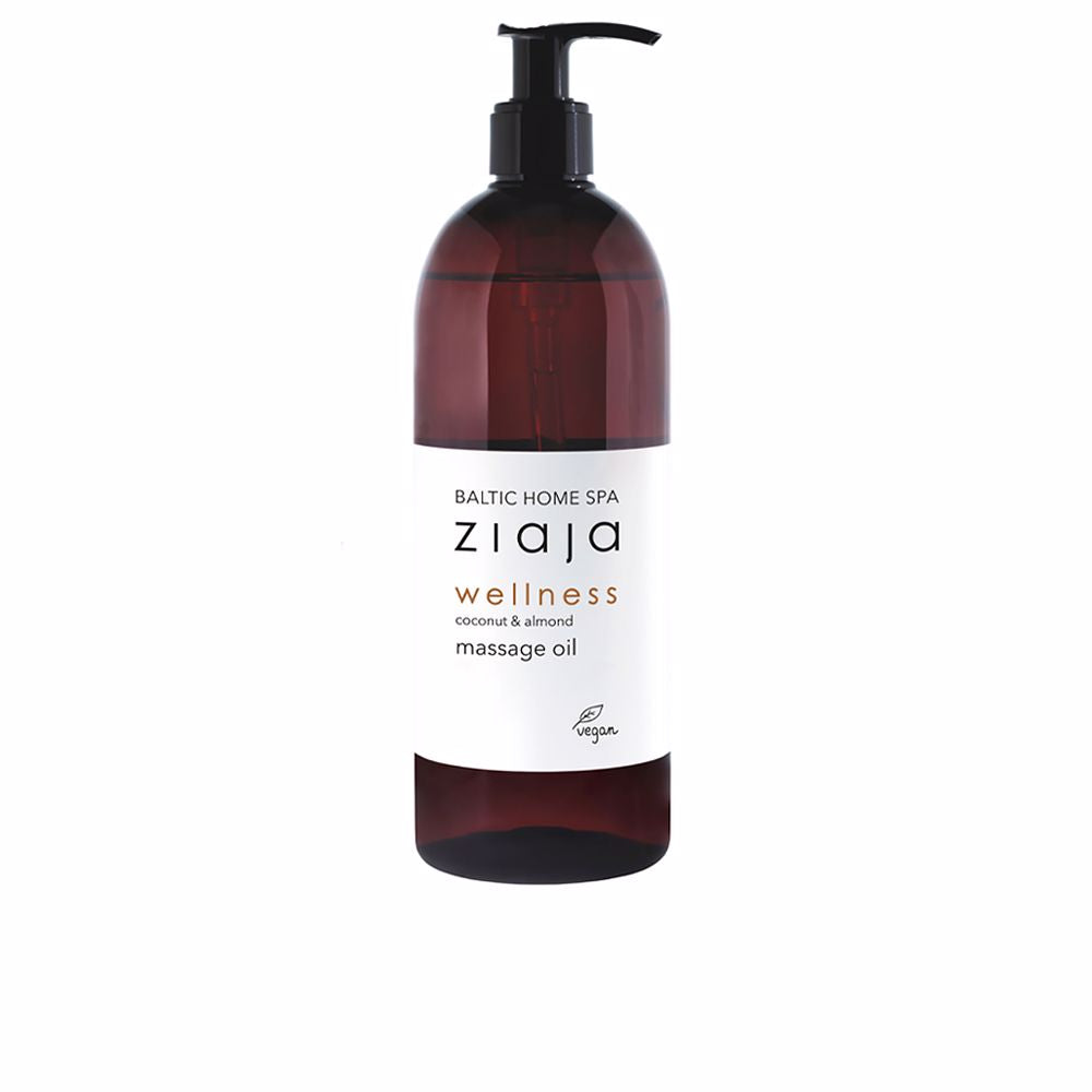 Clear bottle of almond and coconut body massage oil, 490 ml, natural ingredients listed