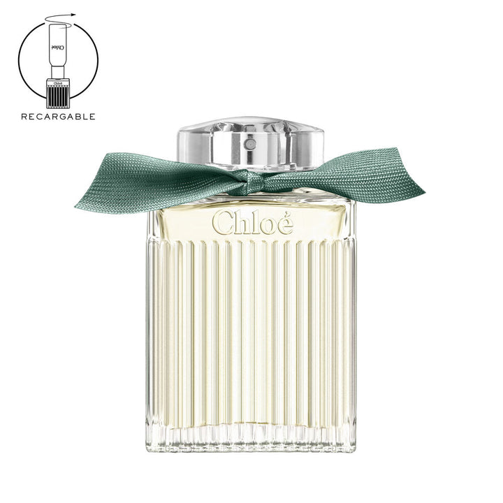 100 ml glass perfume bottle with recycled ribbon, green accent, woody-floral fragrance