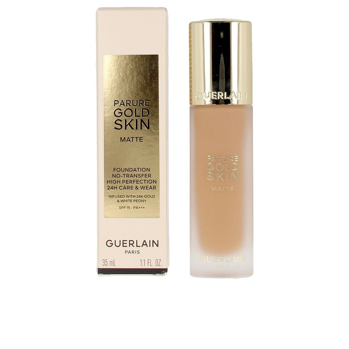 Bottle of matte foundation labelled 35 ml with subtle golden shimmer detail