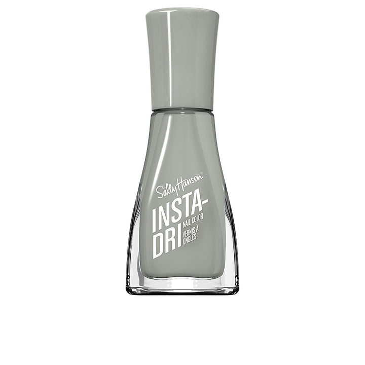 Small 9.17 ml fast‑dry nail polish bottle with contoured brush, deep red shade