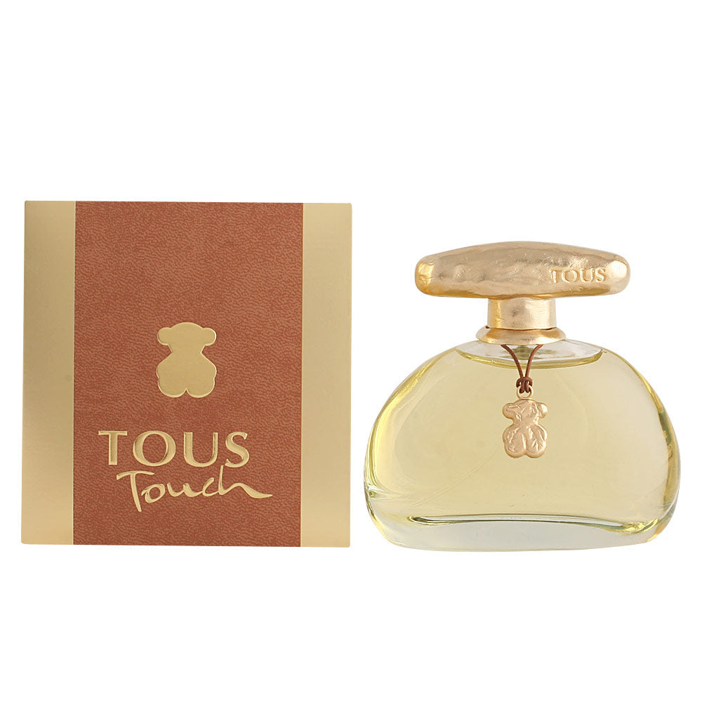Oval amber-tinted glass perfume bottle with gold cap and pendant, 30 ml