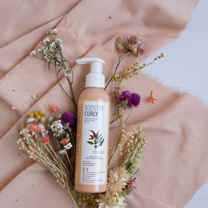 200 ml hydrating curly hair booster bottle; lightweight cream texture