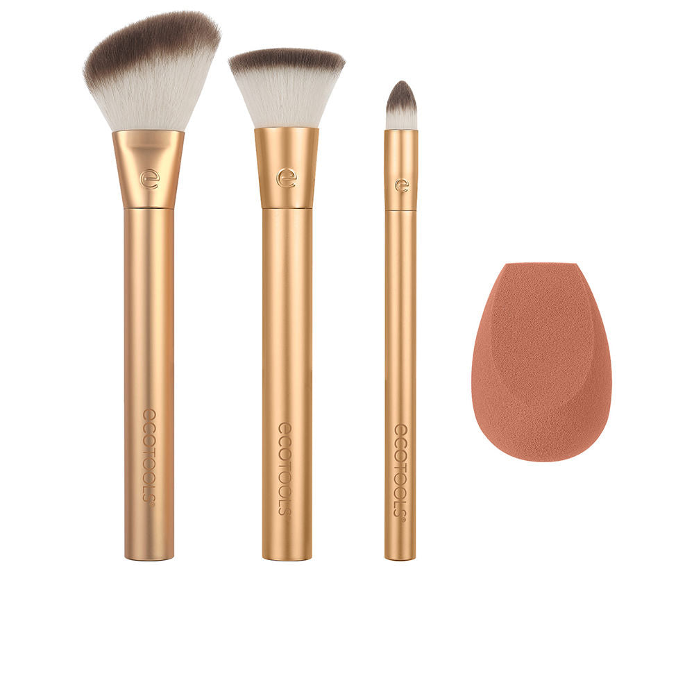 Three gold-handled makeup brushes with gradient white-brown bristles and terracotta teardrop sponge, Ecotools