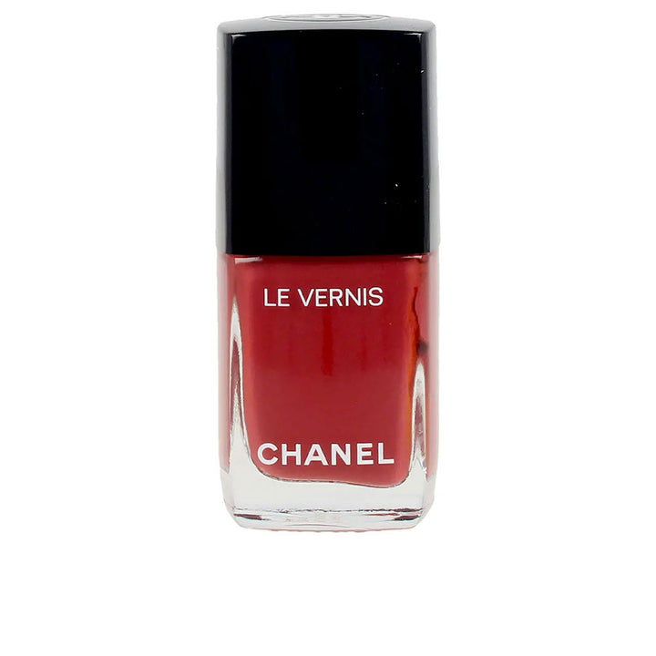 Small 13 ml bottle of high-shine cream nail lacquer, deep red shade, brush applicator