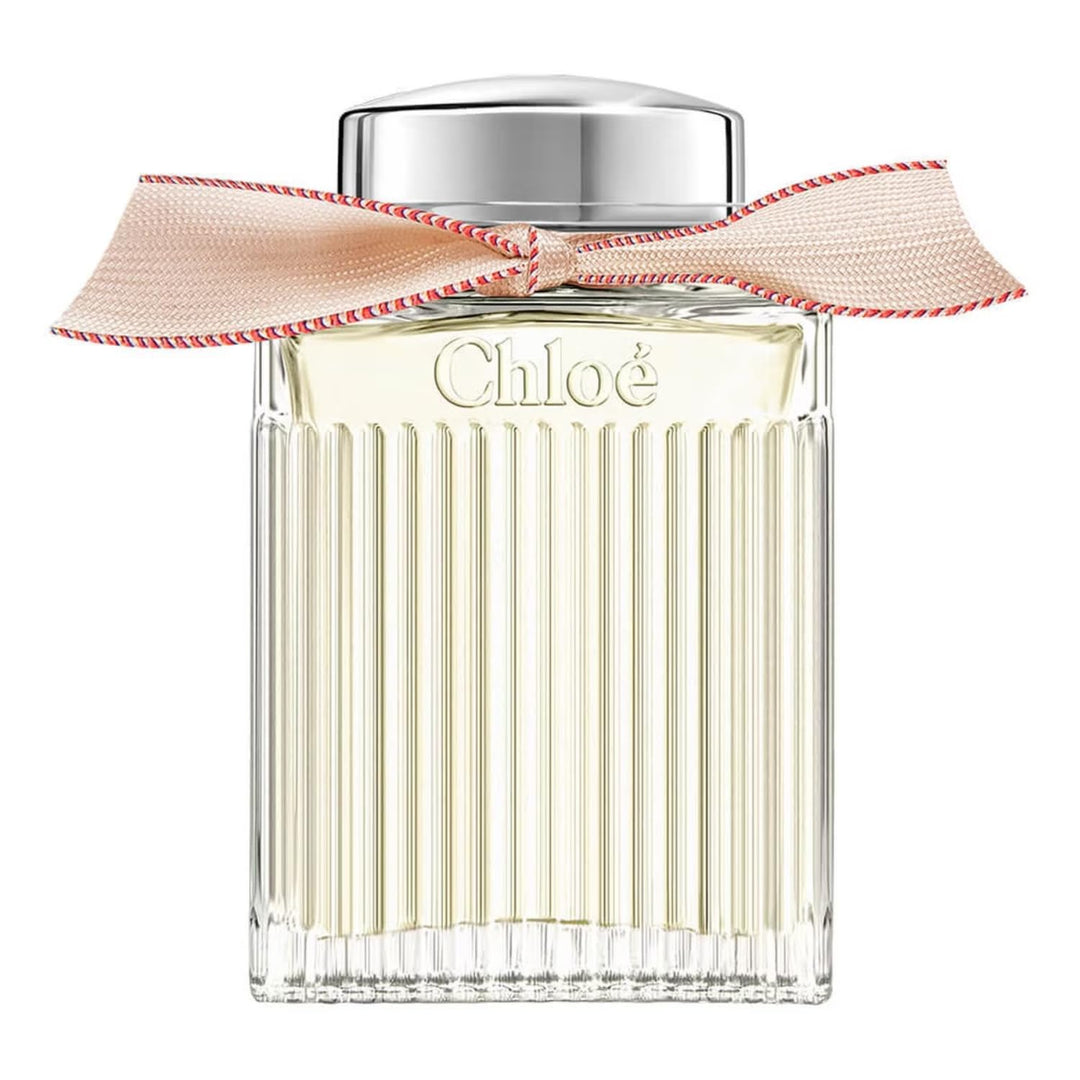 100 ml glass perfume bottle with beige ribbon and silver cap, floral scent