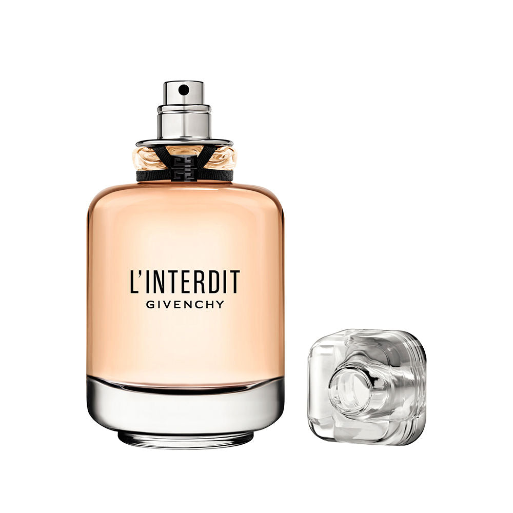 Heavy glass perfume bottle with black ribbon, floral-woody Eau de Parfum for Women