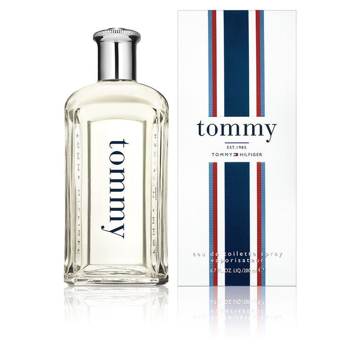 Clear sculpted bottle of woody-citrus Eau de Toilette, 100 ml, silver cap