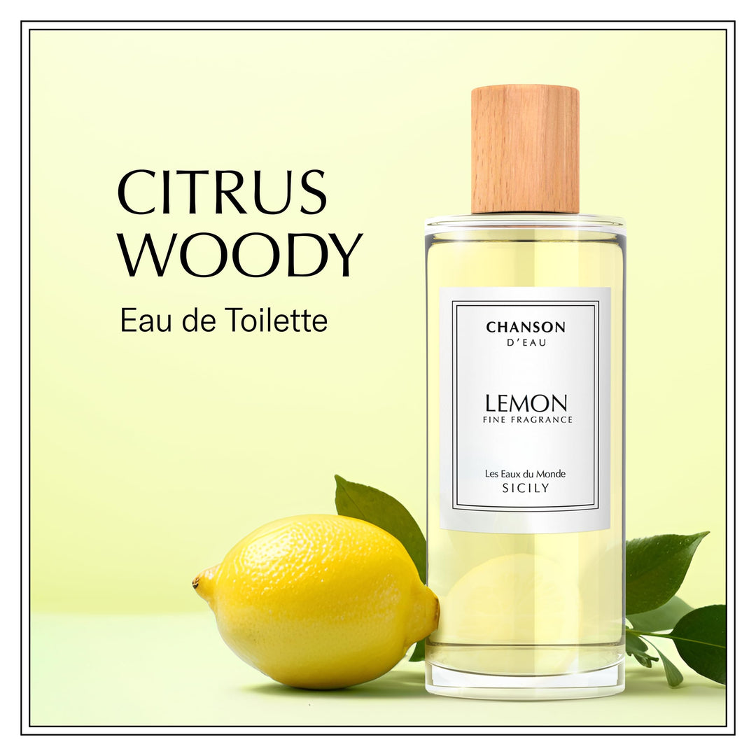 Clear 100 ml perfume bottle with yellow citrus fragrance, minimalist label