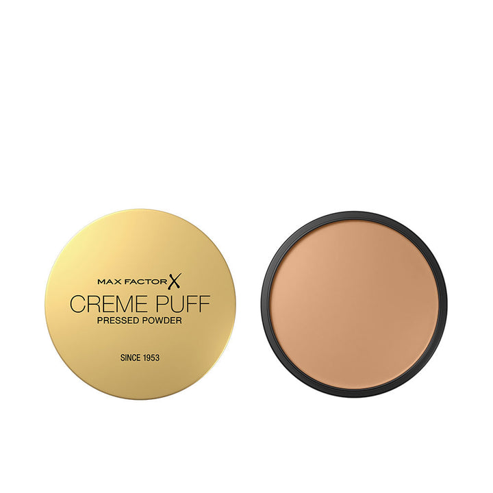 14 g pressed powder compact in Medium Beige, smooth creamy matte surface