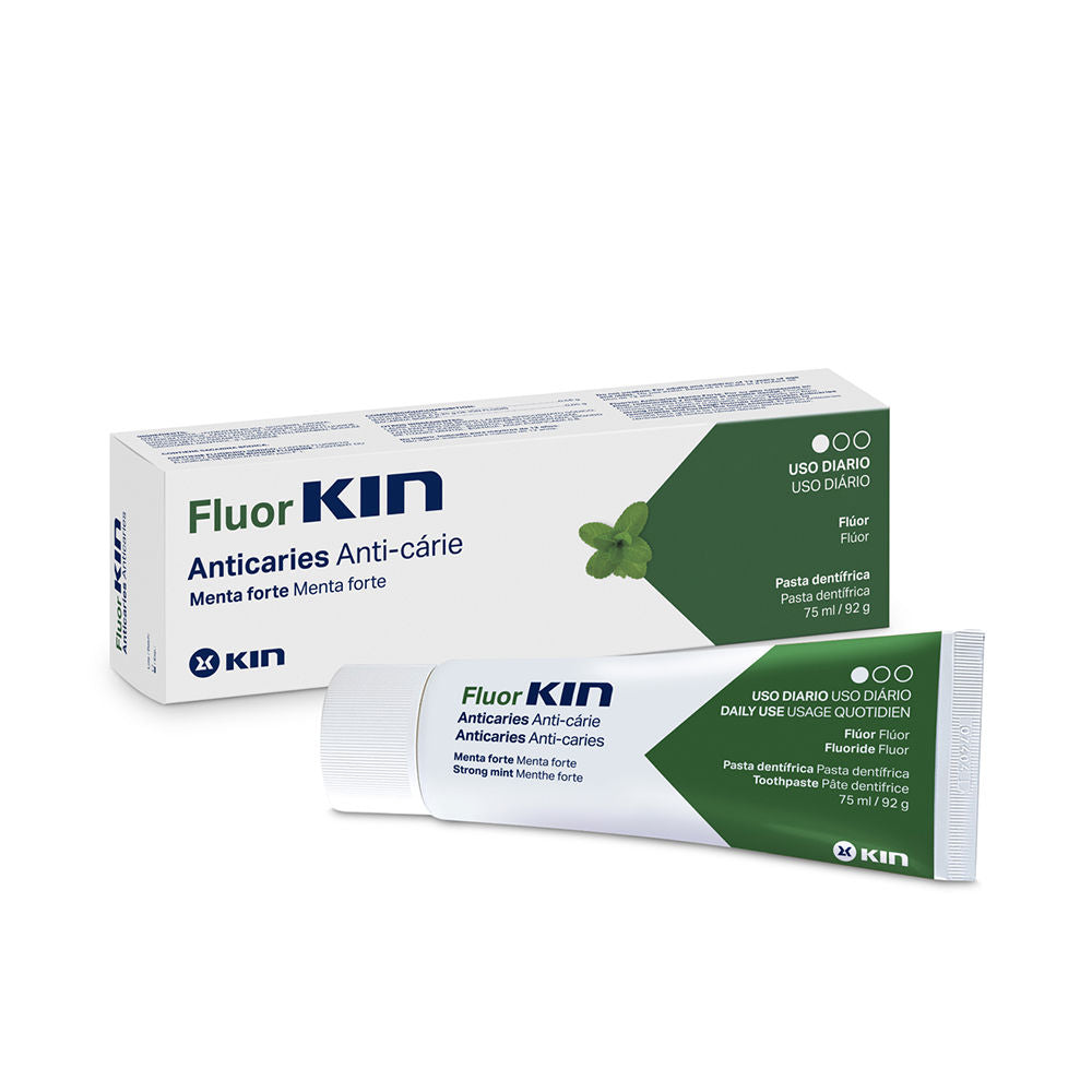 Kin White and green toothpaste tube and box with mint leaf graphic, twist cap, plastic tube and cardboard box
