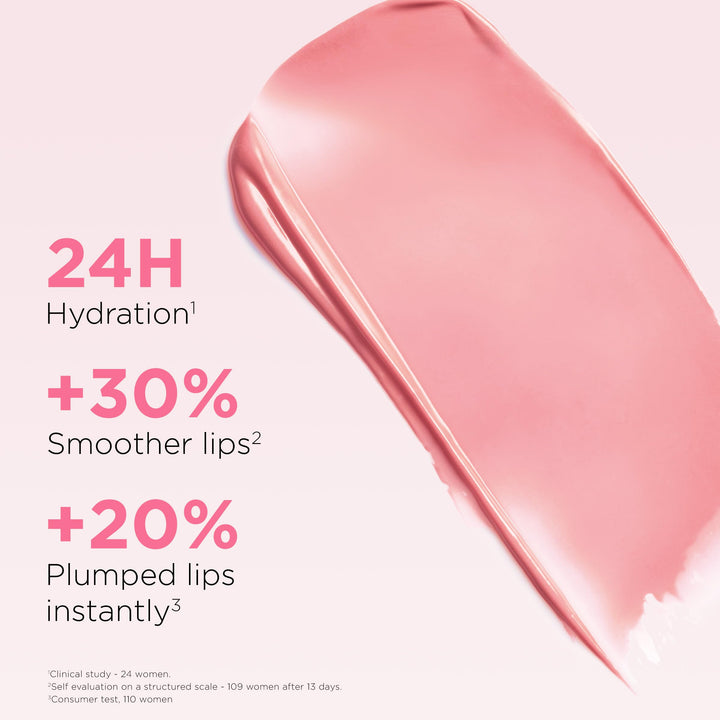 Clarins pink-and-gold twist-up lip oil balm with transparent cap, angled tip, and gold metallic base