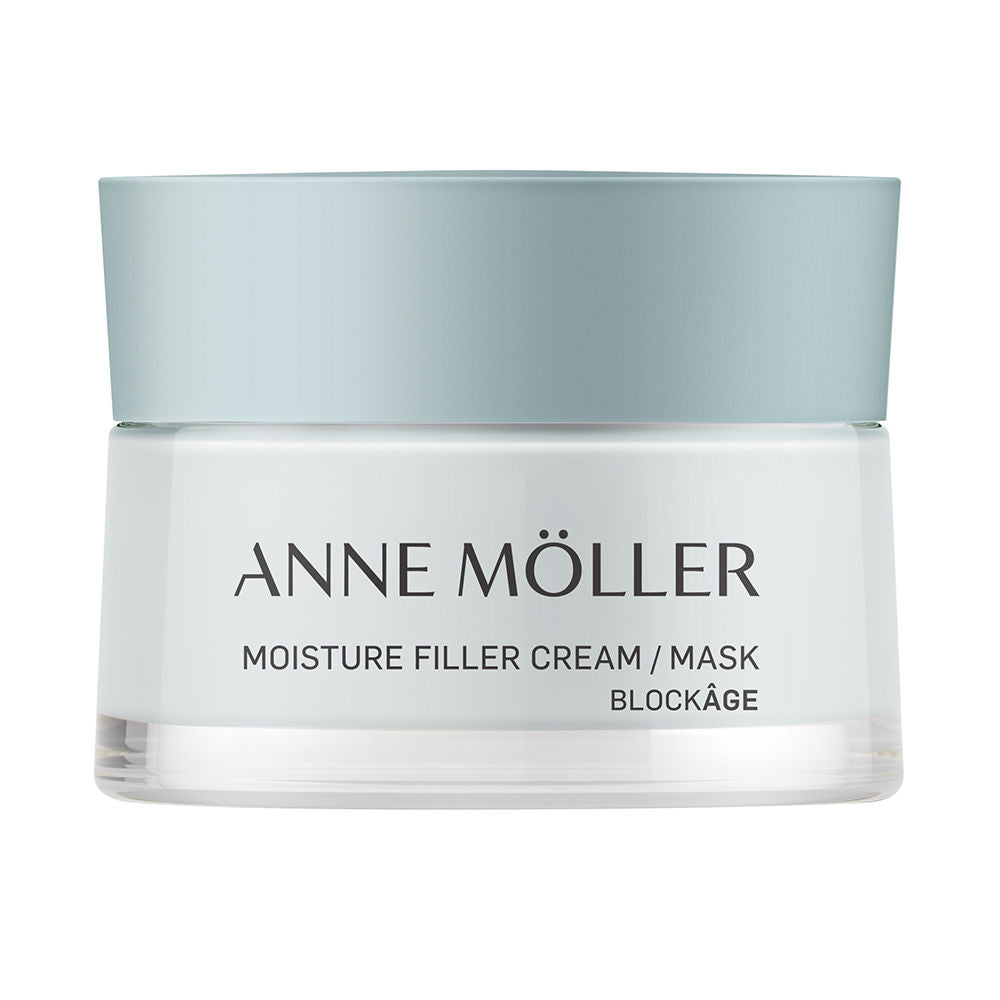 Anne Möller Minimalist cylindrical plastic cream jar with screw-on white lid, light blue label and transparent base
