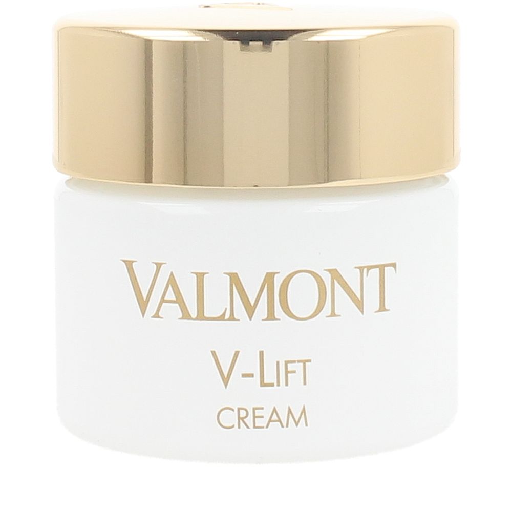Valmont White plastic cylindrical face cream jar with gold metallic lid, printed brand name visible on container