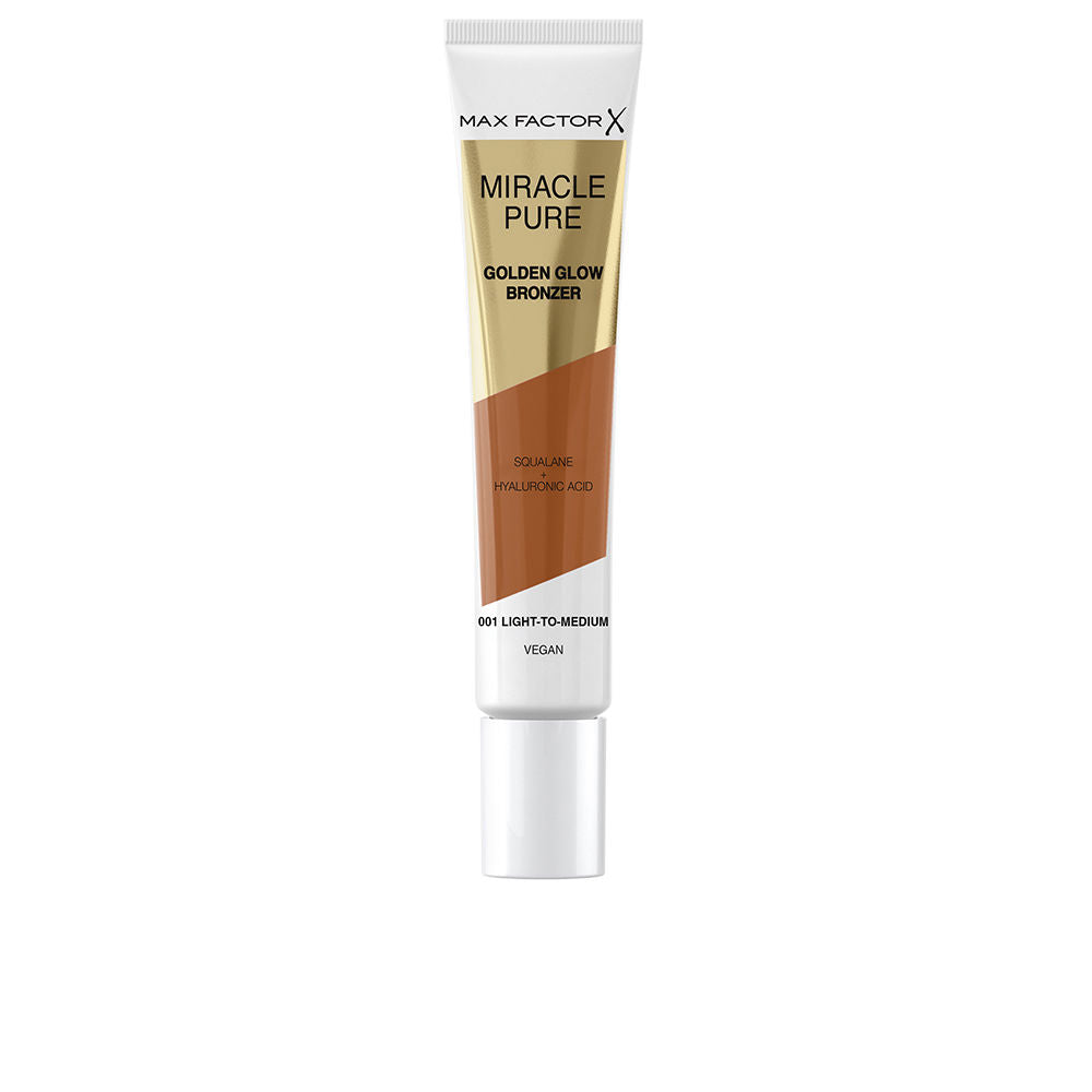 Max Factor bronzer in white, gold and brown plastic tube with screw cap, modern minimalistic design.