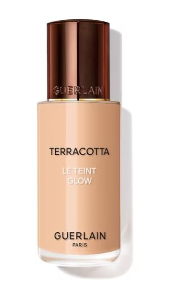 30 ml dispenser of Terracotta Glow fluid foundation, warm 2W shade