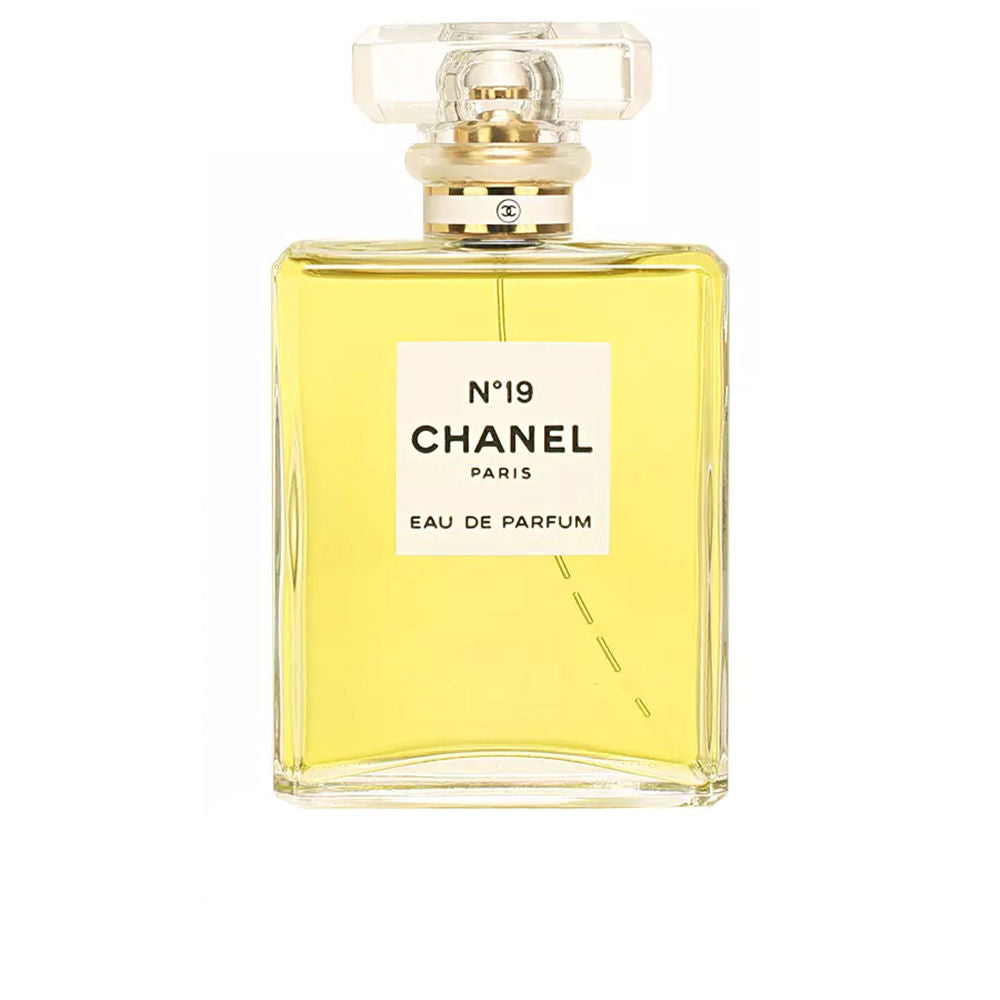 Clear sculpted perfume bottle, woody‑floral Eau de Parfum, 100 ml for Women