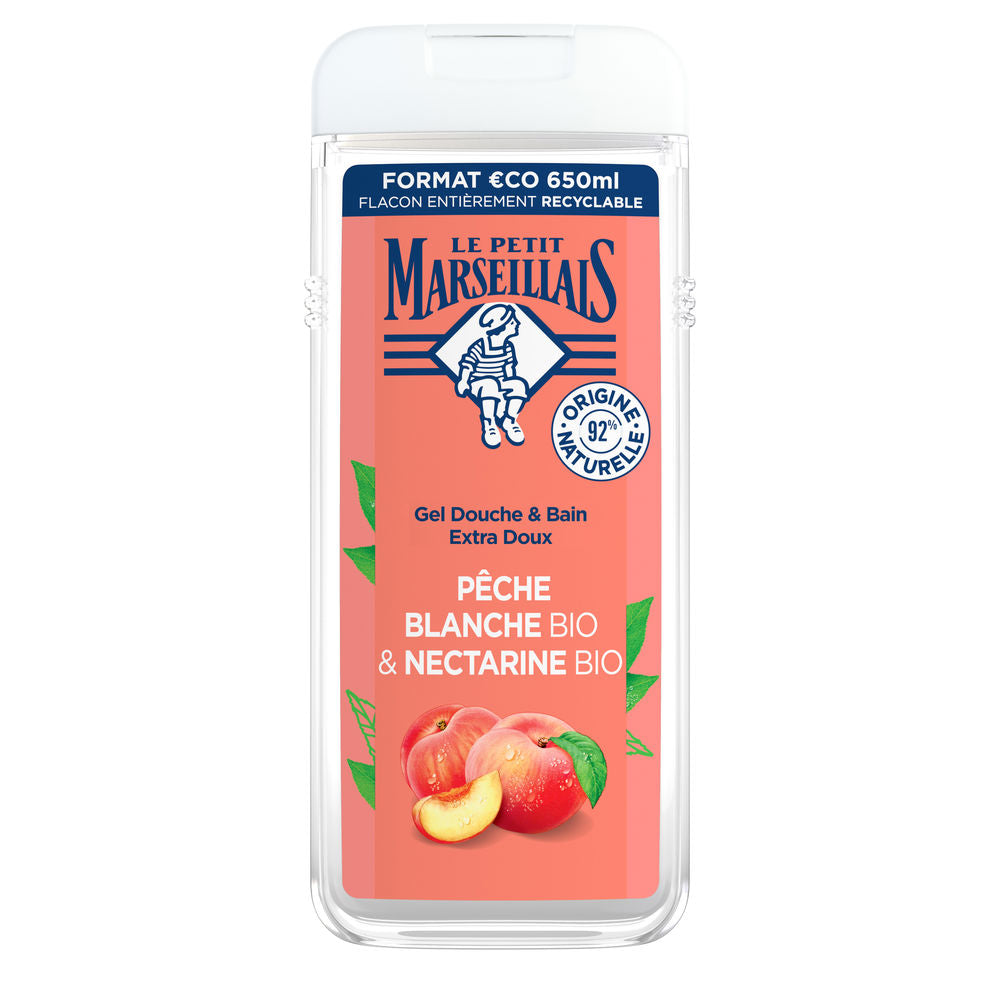 Bottle of Le Petit Marseillais shower gel with white peach and nectarine imagery