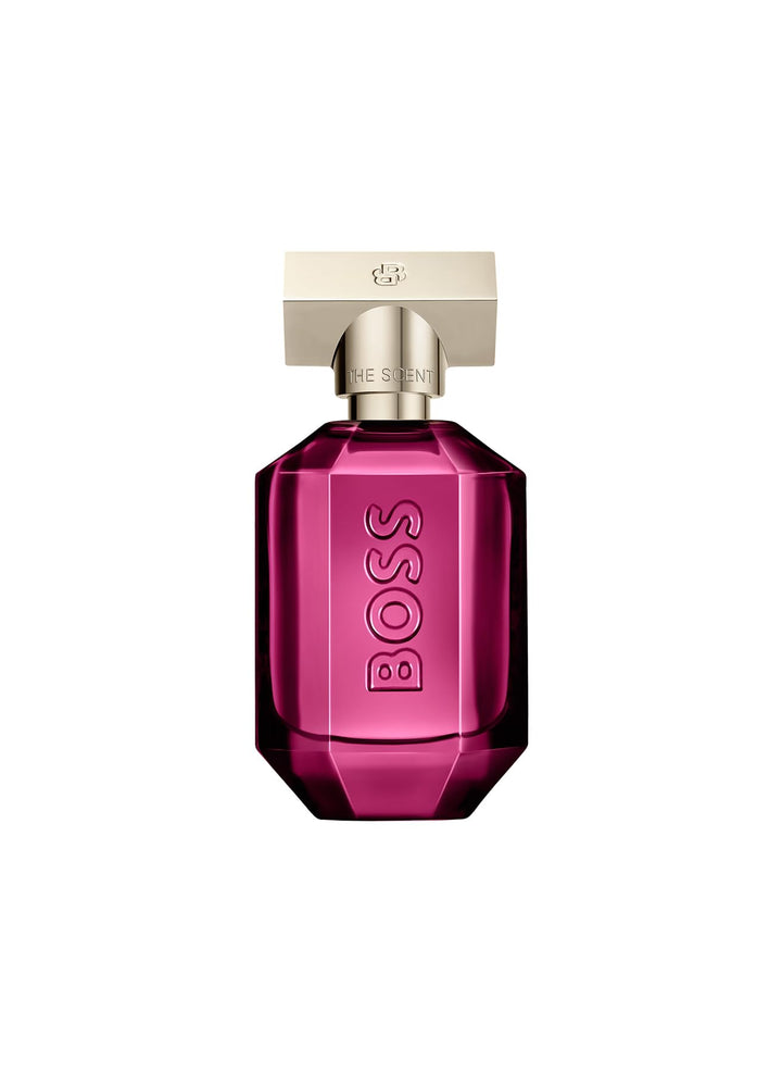 Faceted purple 50 ml perfume bottle with frosted gold cap, amber-musk fragrance