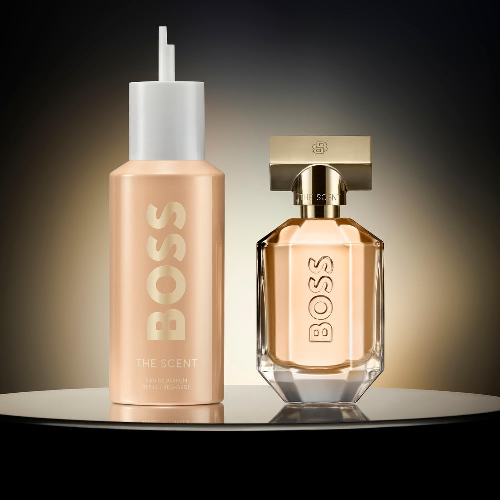 Translucent 150 ml amber‑toned perfume bottle with gold cap, refillable design