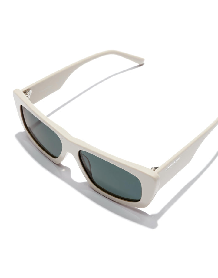 Hawkers White cat-eye sunglasses with thick solid frame, dark rectangular lenses, slim temples, artisan-crafted finish