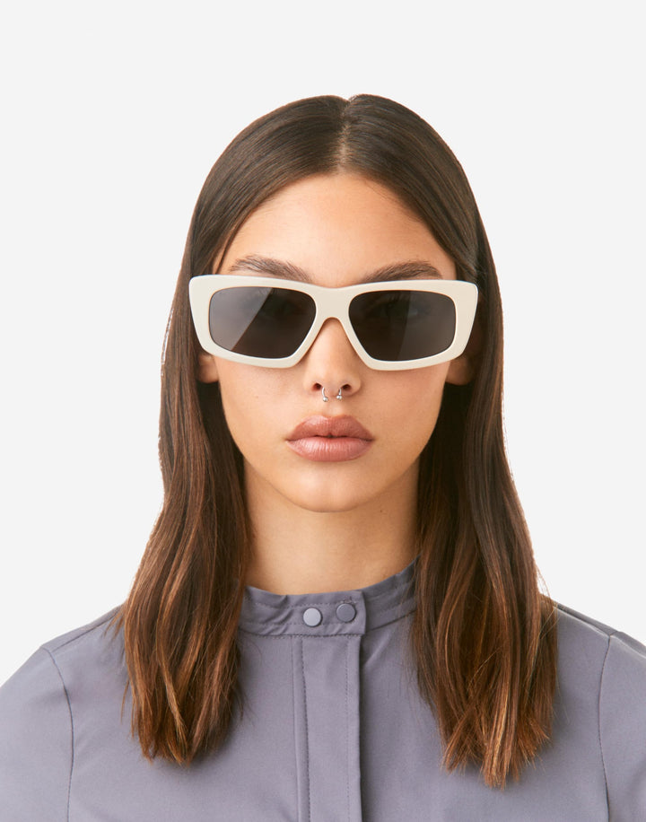 Hawkers White cat-eye sunglasses with thick solid frame, dark rectangular lenses, slim temples, artisan-crafted finish