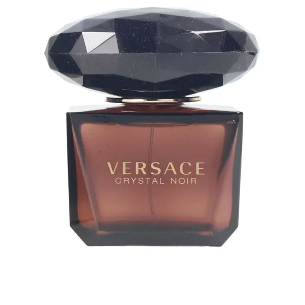 Versace Glass rectangular perfume bottle in brown and black with faceted cap and gold logo, refined silhouette
