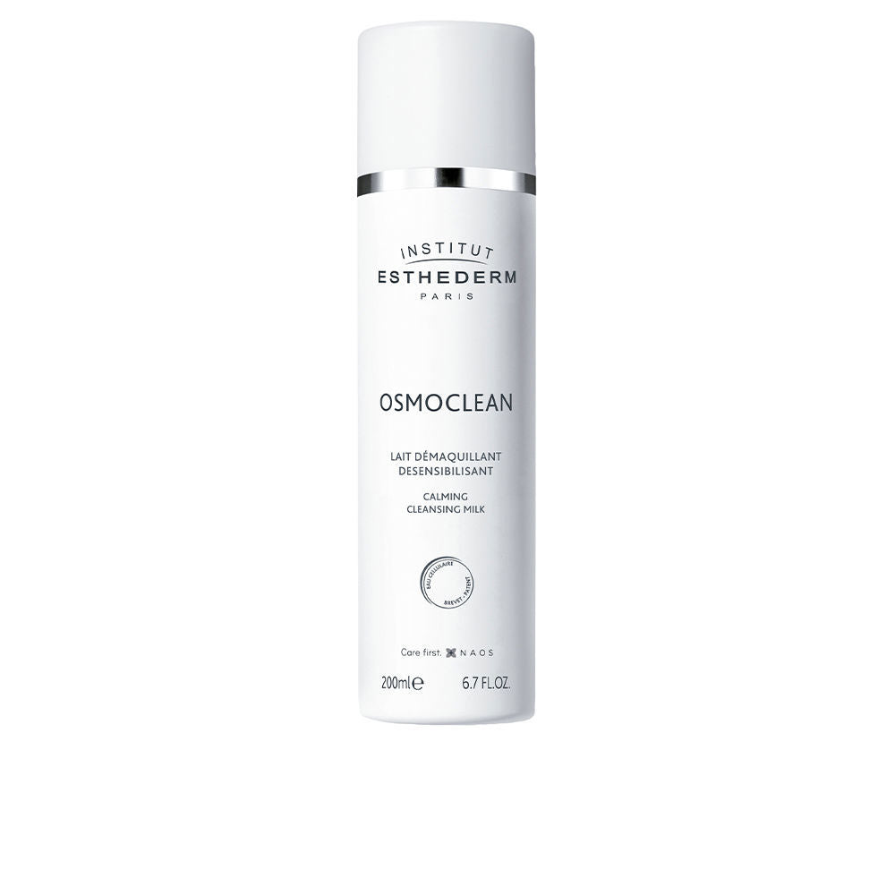 White cylindrical plastic cleansing milk bottle with silver band, minimalist modern design, Institut Esthederm