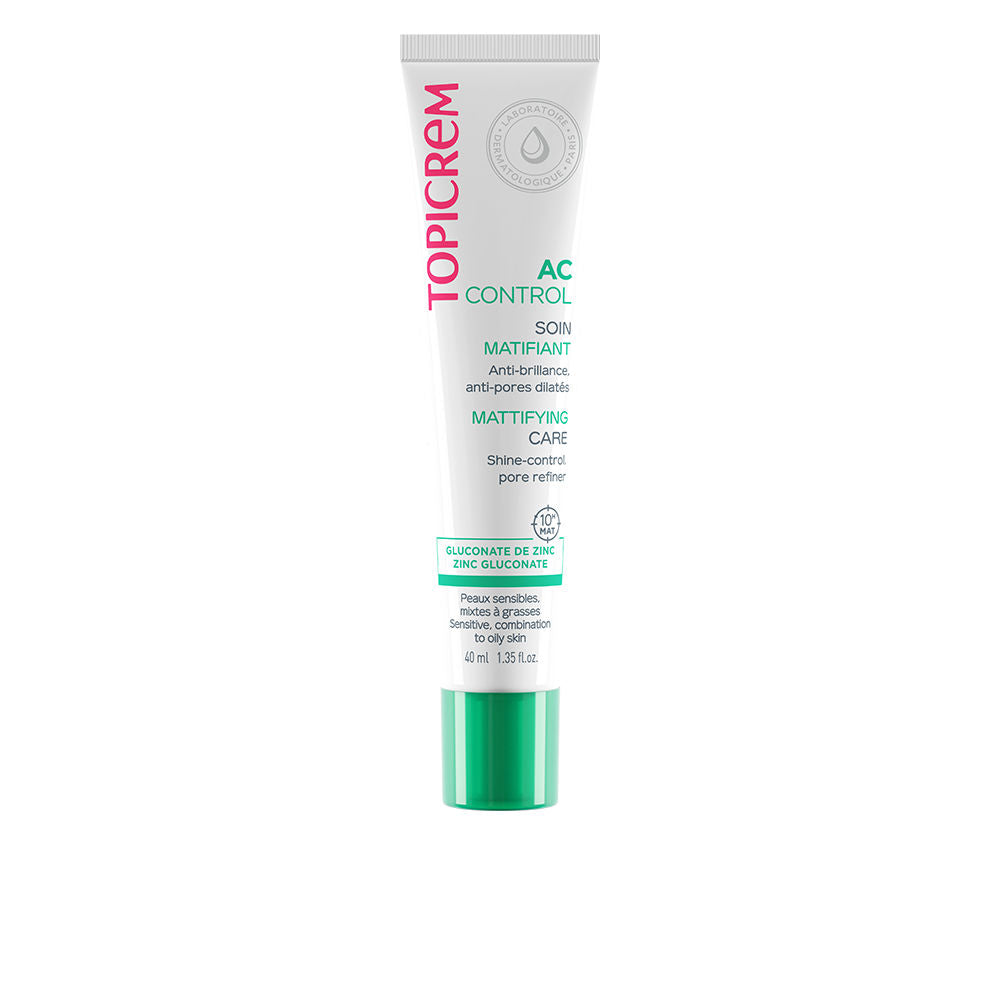 White, green, and pink plastic cream tube with screw cap, minimalist clinical design, branded Topicrem