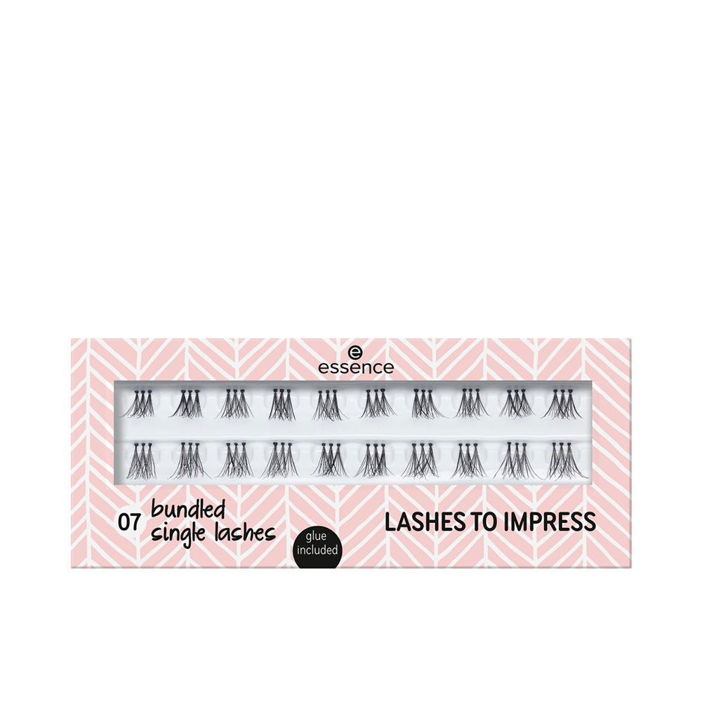 Tray of pre-cut individual lash clusters with small adhesive tube, natural finish