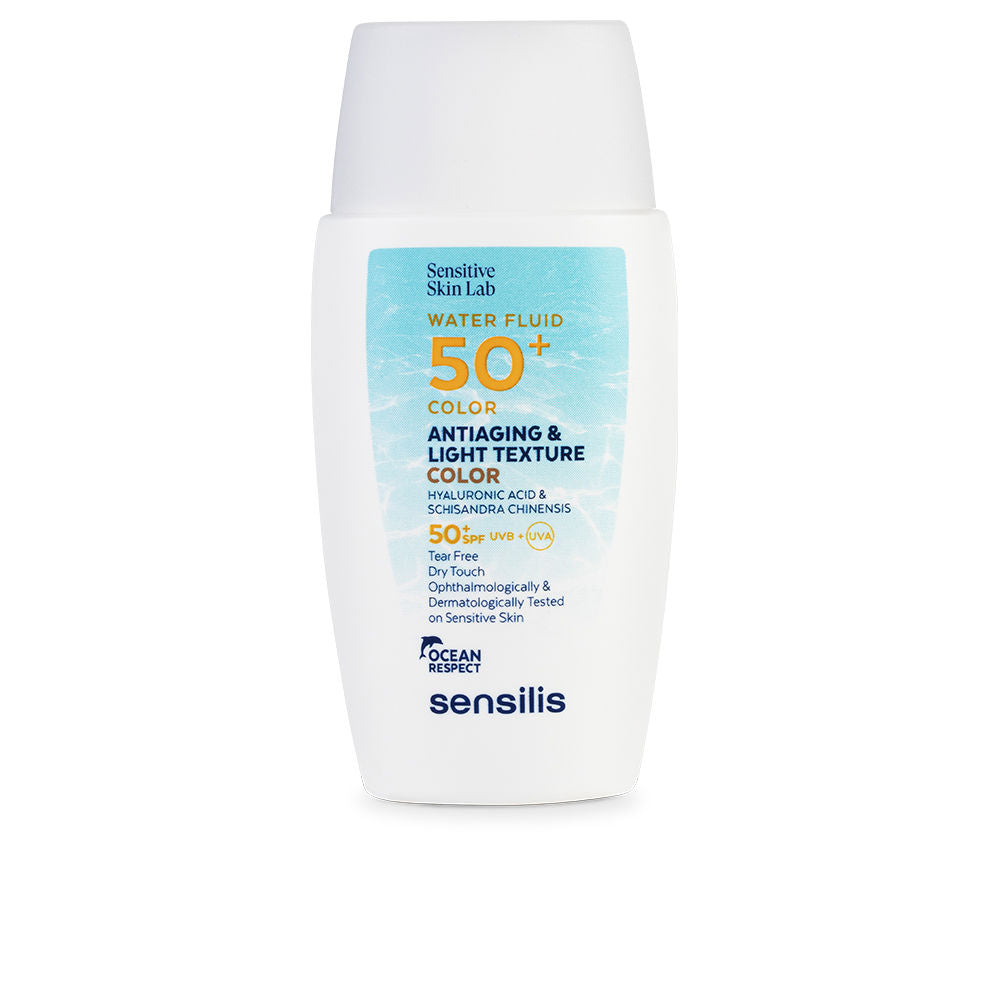 Sensilis Plastic sunscreen fluid tube with flip-top cap, white with blue and orange accents, minimalist label