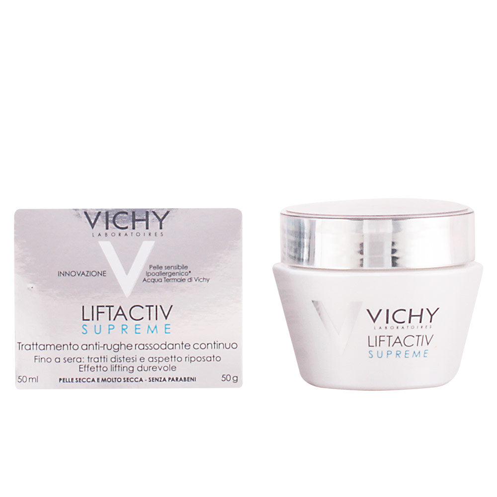White cream in a minimalist plastic jar with silver screw lid, photographed with soft lighting — Vichy