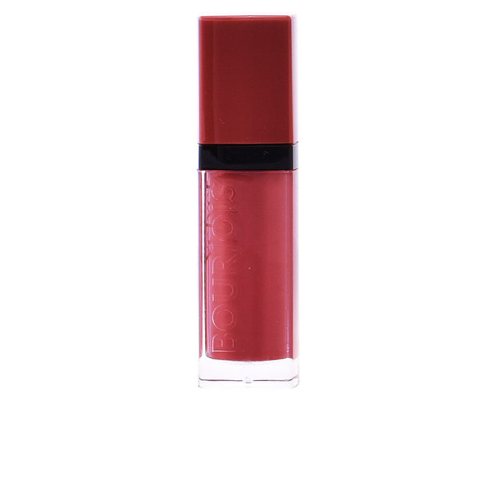 Tube of velvet matte liquid lipstick in deep rose-brown, with foam applicator