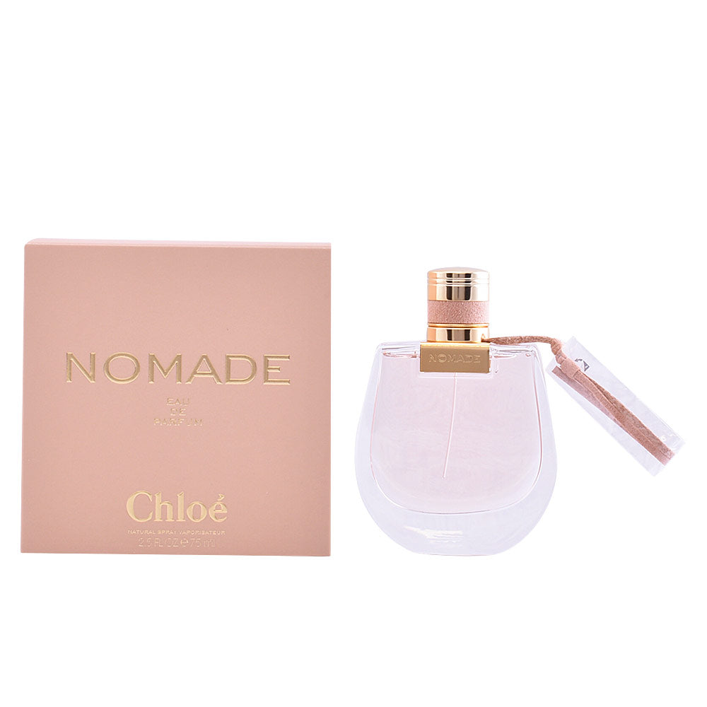 75 ml clear glass perfume bottle with pale liquid, minimalist label, gold cap