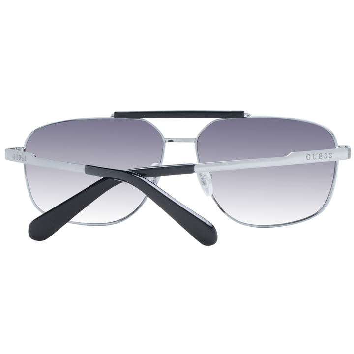 Unisex silver metal aviator sunglasses with double bridge and gradient gray lenses on white background