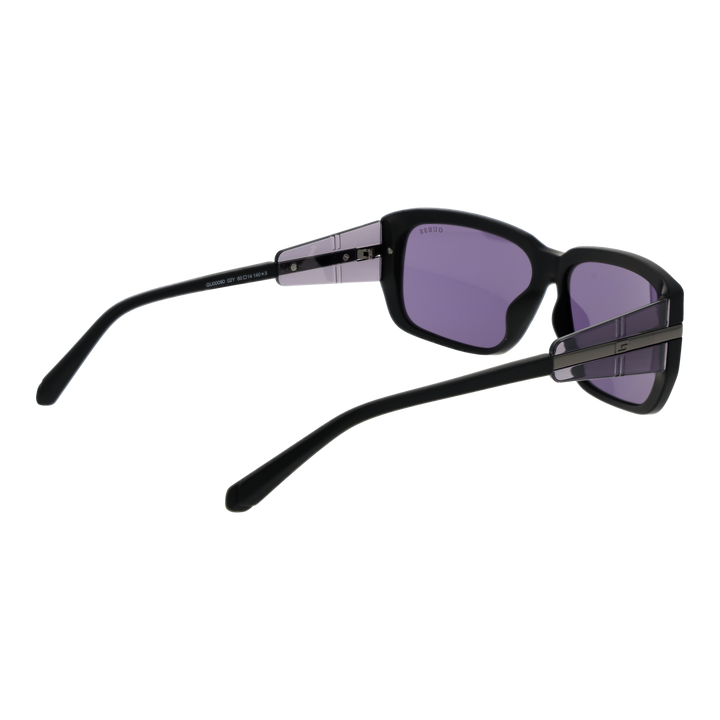 Black plastic rectangular sunglasses with purple lenses and decorative metal-accented side panels on neutral background