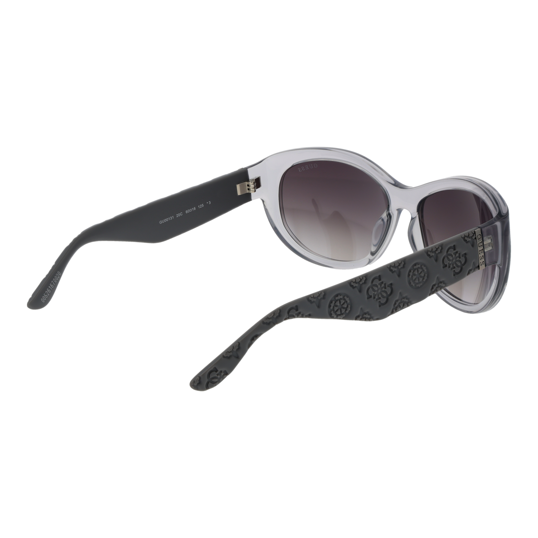 Gray cat-eye sunglasses in plastic with gradient lenses and embossed temples, Guess logo visible