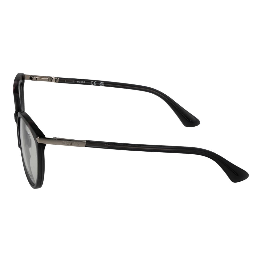 Black tortoiseshell round eyeglasses with metal temple accents and engraved brand detail