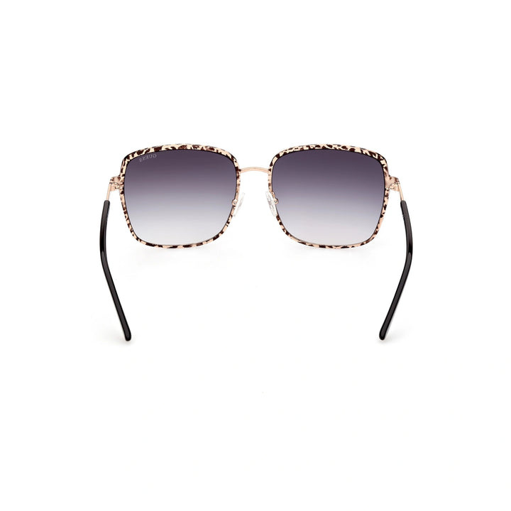 Beige and black patterned square sunglasses with gradient lenses and gold accents on a white background