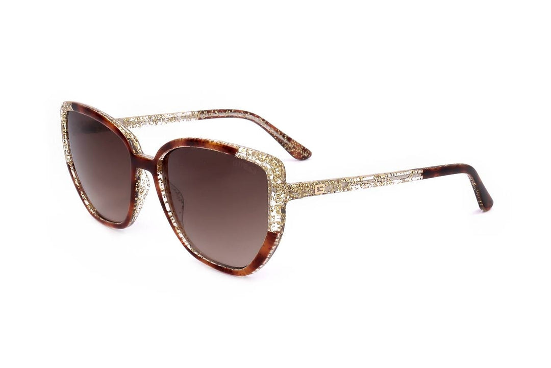 Brown and gold glitter cat-eye sunglasses with gradient lenses on white background, fashionable Women’s accessory