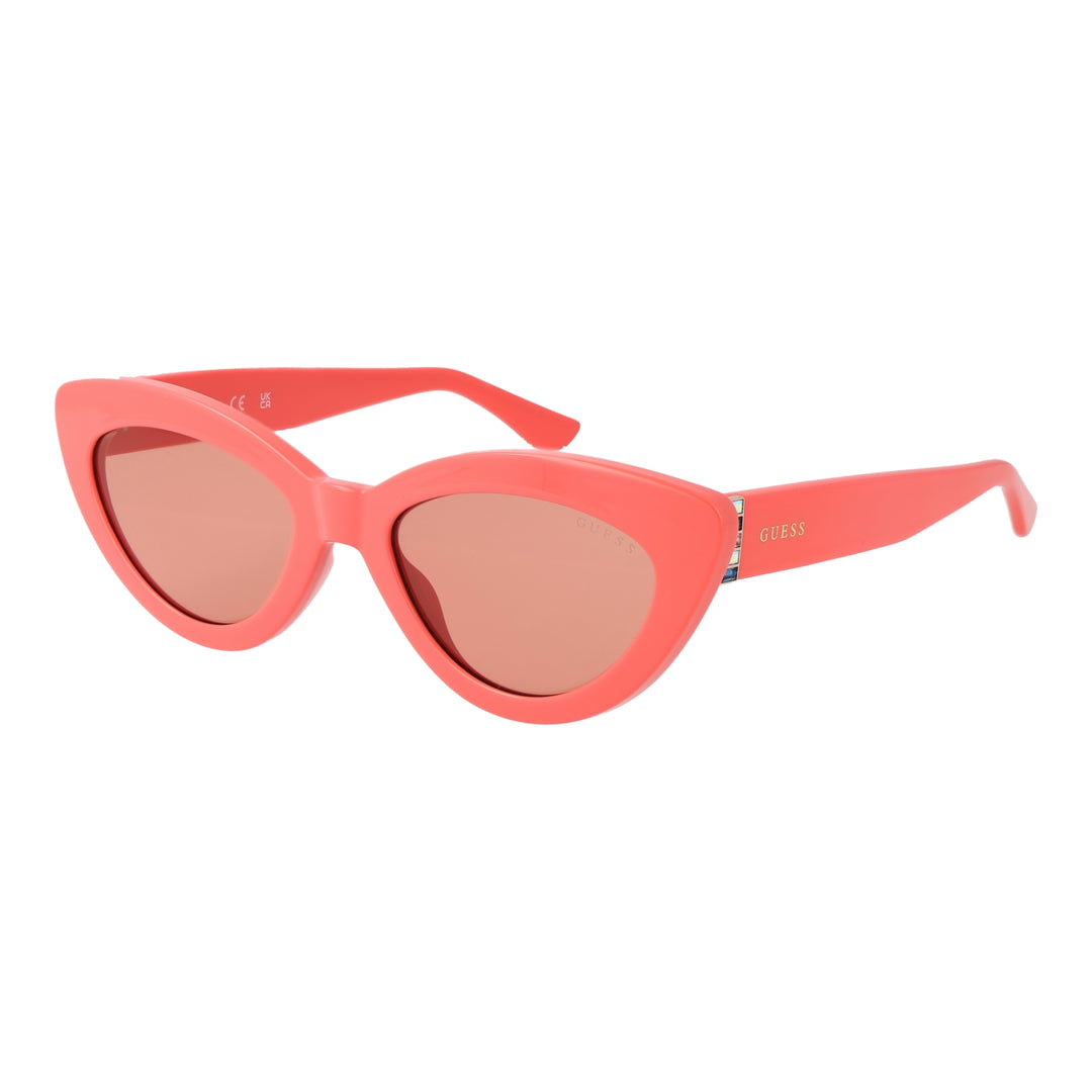 Coral pink cat-eye sunglasses with tinted lenses and decorative temples on white background