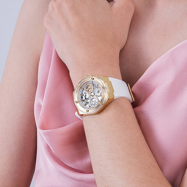 Gold chronograph watch with transparent white silicone strap and multiple sub-dials on white background