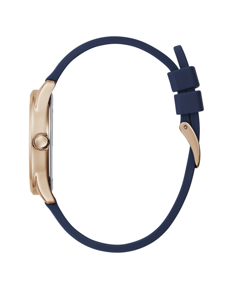Guess rose gold wristwatch with navy silicone strap and rose gold mineral dial, front-facing on white background