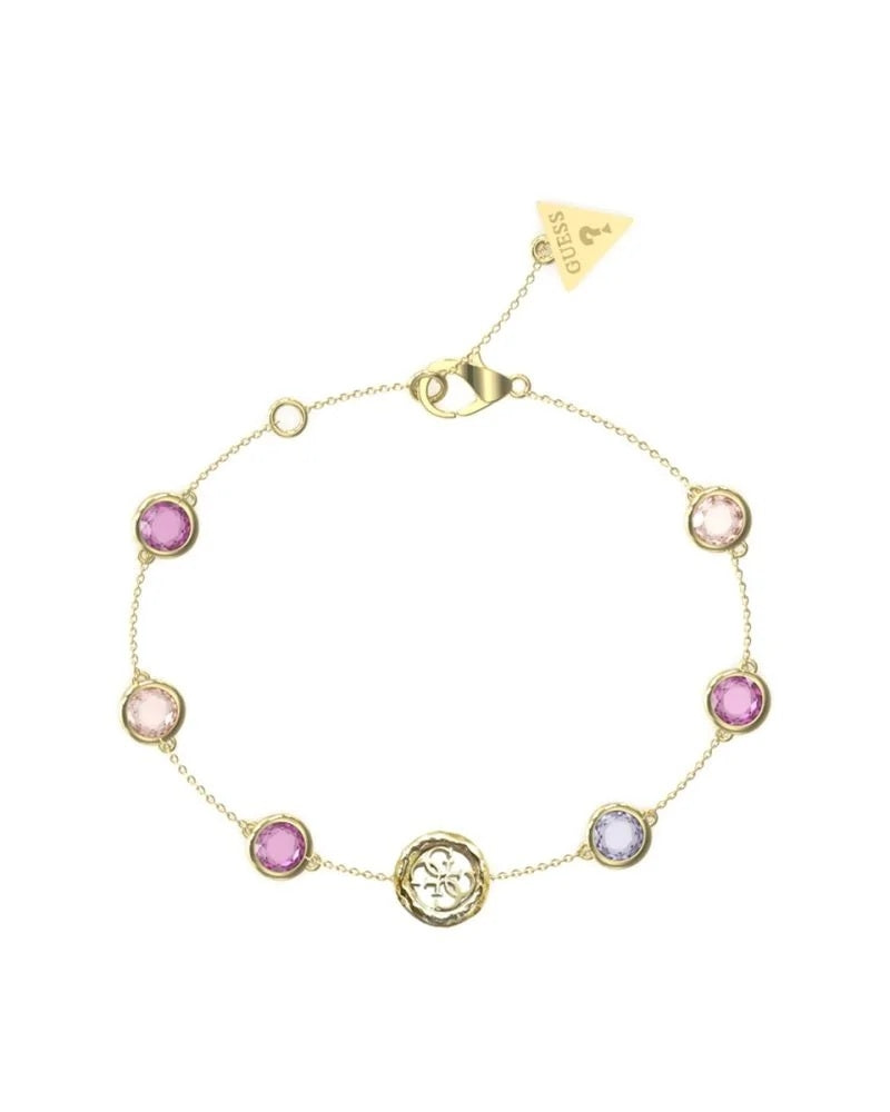Gold chain bracelet with pink and purple round gemstones and a small logo charm on wrist